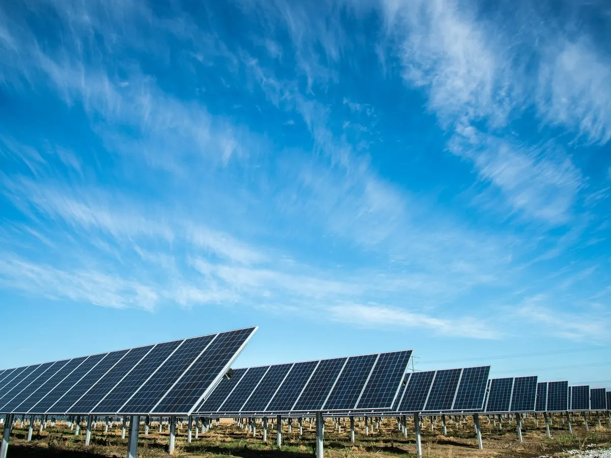 Solar panels under a blue sky