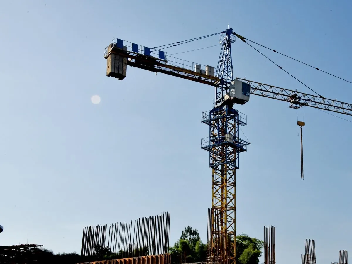 A tower crane over a building site